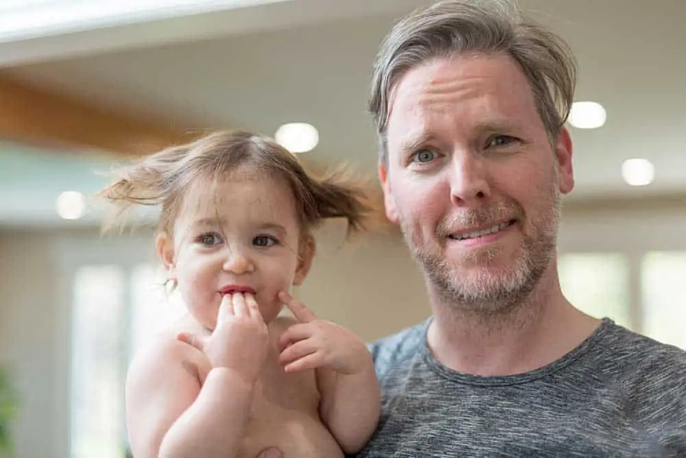 Dad holding baby