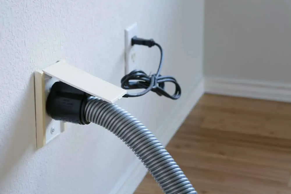 central vacuum hose outlet