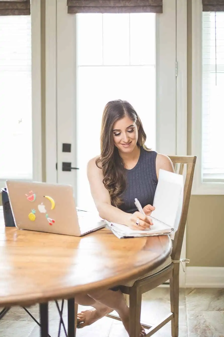 Melissa with laptop and notebook